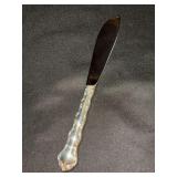 Sterling “Tara” pattern spreader by Reed & Barton - research indicates that just the handle weighs approx. 10-15 grams