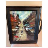 15 by 19 inch black framed oil on canvas of oriental market