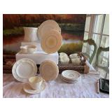 27 piece collection of Ireland Belleek yellow shell bone China. Very delicate.. 10 inch platter., 8 inch plate, 5 1/4 inch vase/jar,  5 1/4”. 1/bowl, two 6 1/2 inch plates,2 -6 inch plates, 10 sauce