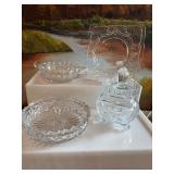 Four pieces of Crystal and cut glass. Two bowls, a plate and a honey/jam jar.