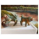 Pair of 6” Chinese lion dogs pottery pieces.  A couple of minor chips un noticeable.