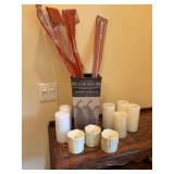 Miscellaneous group of items, trashcan, candles, false candles, and 4 cafe rods