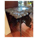 Hand carved intricately detailed table with removable top and folding base 26” x 27” x 24”.