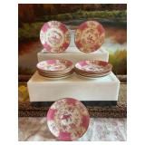 Set of 12 Minton Pink Cockatrice bone china saucers. England.