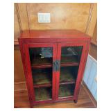 Red and black distressed look oriental shelving unit with brass pulls  29” x 15” x 44”