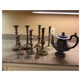 Group of miscellaneous brass candlesticks and a pewter teapot