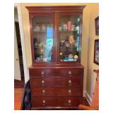 Vintage mahogany combination display cabinet with four drawers and Brass Lionhead pulls. 46“ x 22 1/2”x 90” contents not included