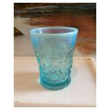 Antique Fenton blue opalescent tumbler. “Waterlily and Cattail” pattern