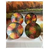 Set a four multicolored enamel on copper 6 inch plates. See photos for chips on one.