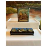 Russian black enamel trinket boxes. Both artist signed