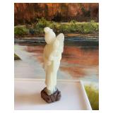 Vintage light green soapstone hand carved figure. 7 inches
