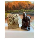 Vintage hand carved green, soapstone flower pot book end and a hand carved wooden oriental figurine. See photos.