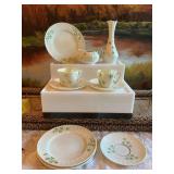10 piece collection ￼of vintage Irish Belleek porcelain China. Three 7 1/4 inch plates, three saucers with 2 cups, a creamer and a 7 1/4 inch vase. Some of the gold is wearing on saucers. Very delic