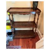 Pretty wood shelving unit. Three shelves -total dimension is 34” x 15” x 42”.