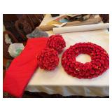 ￼￼ 60 inch red round tablecloth with three red wood decor pieces