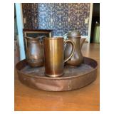 (4) pieces of solid copper - 12” tray, small pitcher, small coffee/tea pot and a mug - there are dents and blemishes