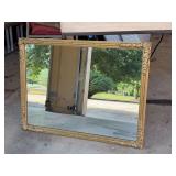 Beautifully gold gilt decoratively framed mirror - setup to be hung horizontal but can also be vertical - 32-1/2 x 24-1/2