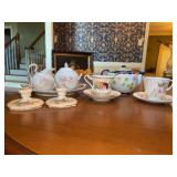 Grouping of fabulous porcelain pieces - (2) Royal Albert candleholders, Paragon cup/saucer set, Sovereign China Ltd cup/saucer set, 3-pc set by M. Redon