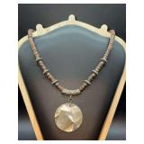 Beautiful Coldwater Creek boho-style beaded necklace featuring coconut disc beads with silver-tone metal accents and a faceted abalone pendan