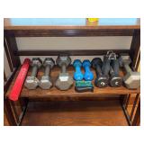 Shelf of various size weights