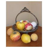 Vintage 19th-century Victorian silver-plated footed fruit basket filled with fruit made from various materials - marble, ceramic resin, stone-like