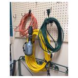 Grouping of (2) extension cords and drop light