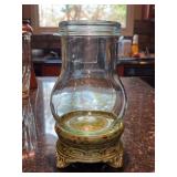 Plus 1 Imports Hurricane Candle Holder - base is an olive green with brown specks and holder has a green tint - 9-1/4” tall
