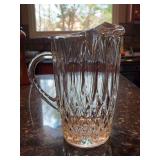 Vintage Anchor Hocking Crown Point clear glass pitcher featuring a vertical optic panel and lower diamond point pattern with ice lip - 9-1/2” tall