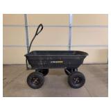 Gorilla Carts 4-cu ft Poly Yard Cart (Model GOR4PS) is a 4-cubic-foot, four-wheel utility dump cart featuring a durable black poly bed and a 600-pound weight capacity