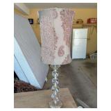 Stacked cylindrical ball table lamp featuring a clear acrylic multi-sphere column base paired with a pink and white paisley pattern fabric drum shade - 27-1/2” tall