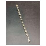 Sterling bracelet with dainty cherub coin medallion design - 7 grams