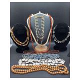 Grouping of long necklaces that can be doubled/some tripled for a shorter length