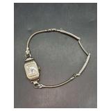 Vintage Gruen ladies watch - band is marked 1/20 12K gold filled - back of watch is engraved and dated 1932