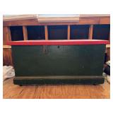 Vintage wooden hope chest on rollers- top has been covered with vinyl -41-3/4 x 20-3/4 x 21-1/2