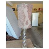 Stacked cylindrical ball table lamp featuring a clear acrylic multi-sphere column base paired with a pink and white paisley pattern fabric drum shade - 27-1/2” tall