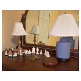 Grouping of miscellaneous home decor - 2 table lamps, white ceramic nativity set, painted partial nativity , glass star ornament