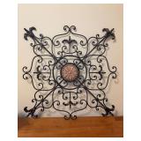 Wrought iron wall art with heavy resin daily medallion centerpiece