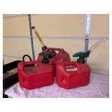 (3) red plastic gas jugs - 2-1/2 gal. with gas in it, 1 gal. marked for chainsaw and 1 gal.
