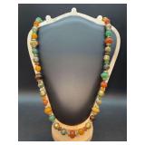 Multi-stone and agate beaded necklace, often referred to as a "beggars