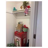 Contents of bedroom closet - Christmas decor, vintage oil lamp, electric bird lamp and more