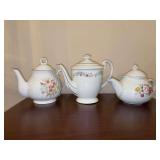Grouping of (4) very nice porcelain/ceramic teapots with floral motifs - from left to right- Supreme Porcelain Bangladesh, Fine China Japan and Unmarked