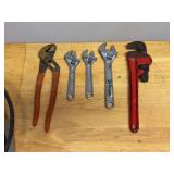 Grouping of crescent wrenches, channel locks and 19” pipe wrench