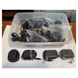 Tote full of various chargers, extension cords, electric skillet plug-in (vintage phone chargers, possibly tool chargers, etc.)