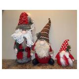 Grouping of Christmas gnomes and Santa with weighted bottoms - from 9-1/2 to 20” tall