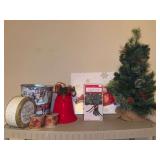 Grouping of holiday decor - tin bucket, velvet bell with bell clapper, boxes for wrapping, 3-outlet time with stake, faux small tree