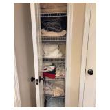 Contents of linen closet in master bathroom - linens, electric blankets on top 2 shelves (unknown if cords match blankets)