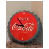 Collectible metal Coca-Cola Bottle Cap Clock by Open Road - there is a scratch on the face - needs batteries