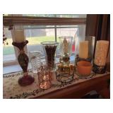 Grouping of candle and glass-related home decor