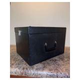 Vintage partitioned storage case, resembling a mid-century portable slide or photo negative file box with a hinged lid, carrying handle, and internal vertical dividers