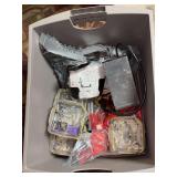 Tote full of wall screws, wall anchors and more